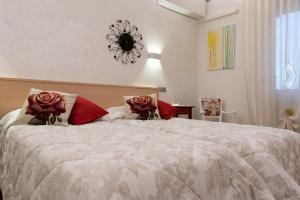 Postel nebo postele na pokoji v ubytování Bed & Breakfast Delle Rose
