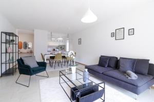 Khu vực ghế ngồi tại Nice apartment ideally located in Martigny