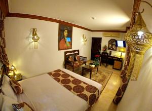 Кровать или кровати в номере Oriental Rivoli Hotel & Spa