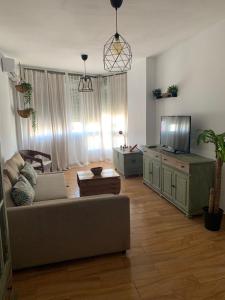 TV a/nebo společenská místnost v ubytování Sanlúcar Playa