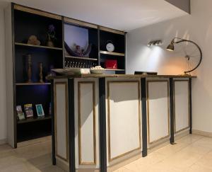 Kuchyň nebo kuchyňský kout v ubytování Hotel Toskana