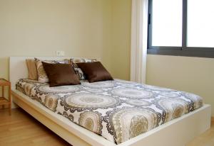 Кровать или кровати в номере MalagadeVacaciones - Pacifico 18