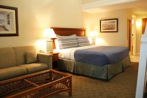 Ein Bett oder Betten in einem Zimmer der Unterkunft Surf Side Hotel