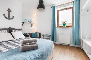 Posteľ alebo postele v izbe v ubytovaní GoodHome - Sea Towers Apartment