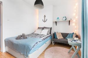 Posteľ alebo postele v izbe v ubytovaní GoodHome - Sea Towers Apartment