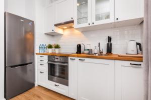 Kuchyňa alebo kuchynka v ubytovaní GoodHome - Sea Towers Apartment