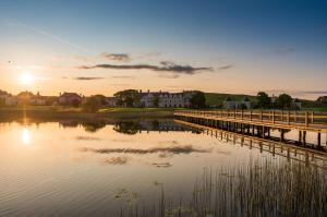 a large body of water with a train on it at Lough Erne Resort in Enniskillen