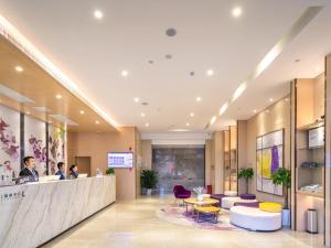 a lobby of a hospital with people waiting at a counter at Lavande Hotel Qingzhen Vocational Education City Time Guizhou in Guiyang