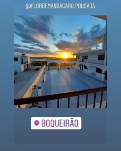 a picture of a sunset on the roof of a building at Flor de Mandacaru Pousada in Boqueirão