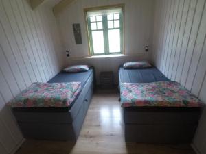 Ein Bett oder Betten in einem Zimmer der Unterkunft Alexanderhaus