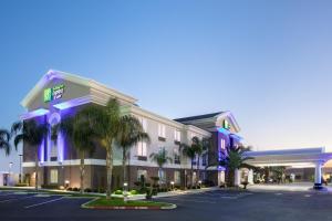 a rendering of a hotel with a parking lot at Holiday Inn Express & Suites Yosemite Park Area, an IHG Hotel in Chowchilla