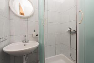 Koupelna v ubytování Apartments Dalmato