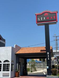 a sign for a lex market in front of a building at The Lexmar - Dodger Stadium Hollywood in Los Angeles