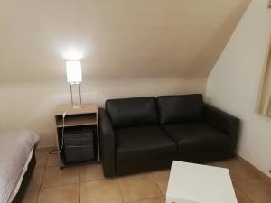 Posezení v ubytování Arconaty Hotel