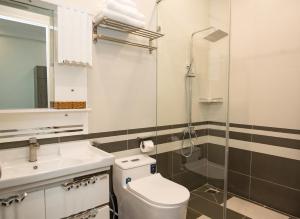 Koupelna v ubytování Amora Hotel & Apartment + 37 fotografií