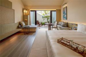 Ένα ή περισσότερα κρεβάτια σε δωμάτιο στο Naera Hotel Xitang +22 φωτογραφίες