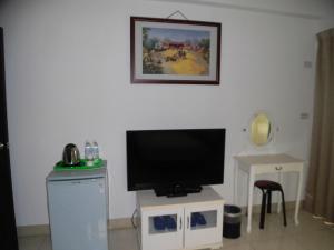 TV a/nebo společenská místnost v ubytování Shiang Ching Home Stay