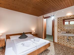 Posteľ alebo postele v izbe v ubytovaní Ferienhaus Gänseblümchen