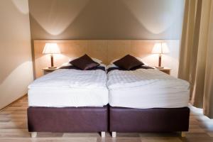 Postel nebo postele na pokoji v ubytování Hotel Hallormsstadur
