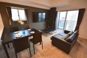 Posezení v ubytování The Grand Residence Hotel Tenjin
