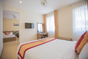 TV a/nebo společenská místnost v ubytování Nice Dream Hotel