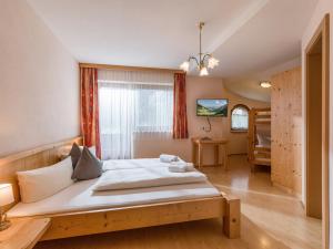 Łóżko lub łóżka w pokoju w obiekcie Ferienhaus Kröll