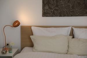 Postel nebo postele na pokoji v ubytování Hotel Weinlaube