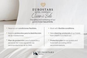 a white sheet of paper with a picture of a woman on it at Eurostars Madrid Tower in Madrid