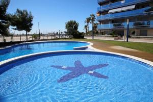Bazén v ubytovaní AT161 Vistas a la playa, piscina y equipamiento completo alebo v jeho blízkosti