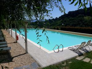 The swimming pool at or close to Bio Agriturismo Valle dei Calanchi