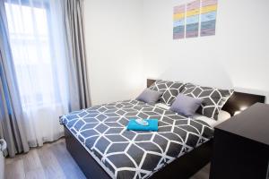 Voodi või voodid majutusasutuse Apartman Fonyód toas