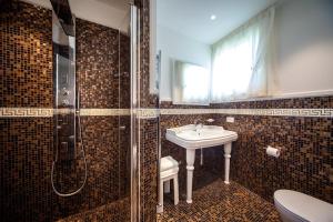 Koupelna v ubytování Hotel Aurelia