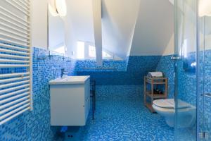 Ett badrum på Apartamenty Świnoujście - Villa Stil 1