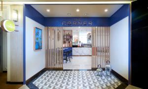 a view of the corner of a room with a restaurant at Amari Don Muang Airport Bangkok in Bangkok