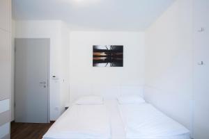 Postelja oz. postelje v sobi nastanitve Apartments Plan Kranjska Gora