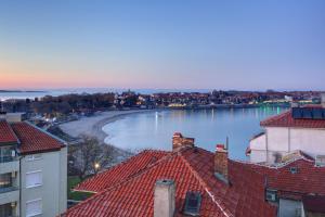a view of a river from roofs of buildings at Guest House Rakovina in Sozopol