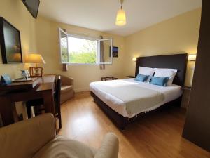 Postel nebo postele na pokoji v ubytování La Fraîchette-Hôtel & Spa