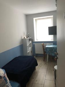 Ein Bett oder Betten in einem Zimmer der Unterkunft Fremdenzimmer Sas