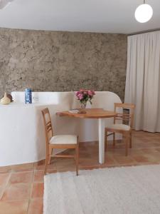 Posedenie v ubytovaní Cortijo El Molino Apartamento"El balconcito"