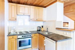 Kuchyňa alebo kuchynka v ubytovaní Ferienhaus Sonnrain