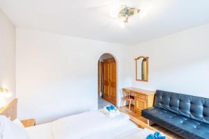 Posteľ alebo postele v izbe v ubytovaní Ferienhaus Sonnrain