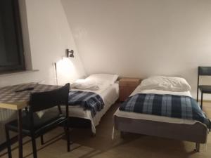 Posteľ alebo postele v izbe v ubytovaní Pokoje Gościnne Irena