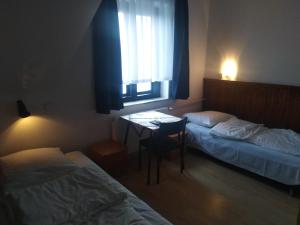 Posteľ alebo postele v izbe v ubytovaní Pokoje Gościnne Irena