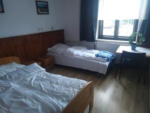 Posteľ alebo postele v izbe v ubytovaní Pokoje Gościnne Irena