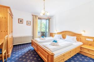 Posteľ alebo postele v izbe v ubytovaní Ferienhaus Sonnrain