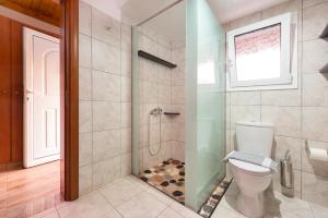 Kúpeľňa v ubytovaní Elefteria Apts & Suites