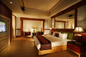 Giường trong phòng chung tại Seasons Boutique Motel