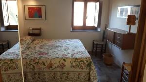 Postel nebo postele na pokoji v ubytování Casa Puccini B&B Maratea