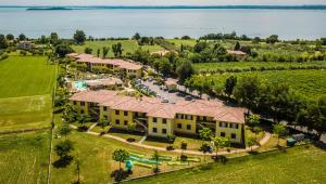 an aerial view of a large house with a pool at Residence Karina in Moniga