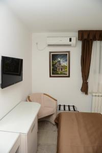 TV a/nebo společenská místnost v ubytování Hotel Sunce